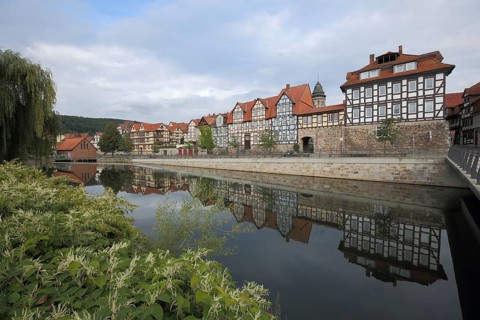 Half-timbered houses with reflections in the Fulda River, Fuldaufer, Hann. Münden, Hannoversch