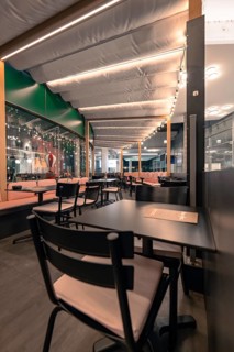 Interior shot of a cosy café with seating and soft lighting, Stuttgart, Germany
