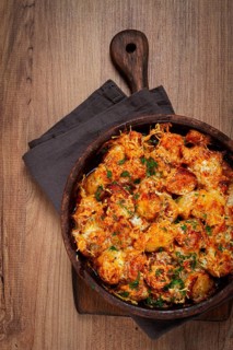 Baked fish with potatoes and cheese, gratin, homemade, no people