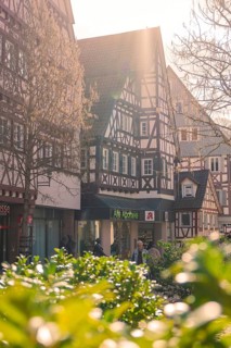 Cosy old town with half-timbered houses and warm spring light, Calw, Black Forest, Germany