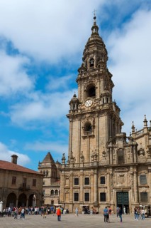 Impressive baroque-style bell tower, surrounded by visitors in fine weather, cathedral, Plaza de la