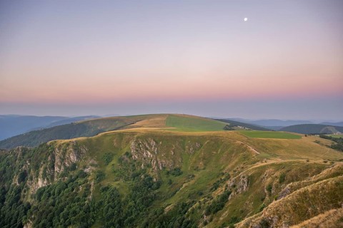 Sunrise mith the moon at Mount Hohneck in the Vosges Mountains, France