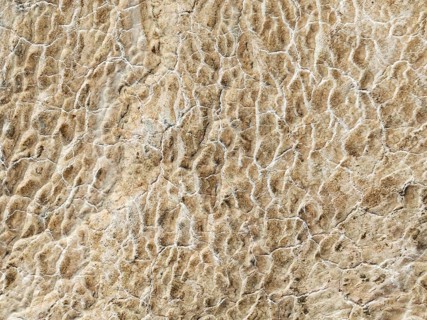 Abstract patterns of saline deposits at the salt works of Walvis Bay. Aerial view. Drone shot.