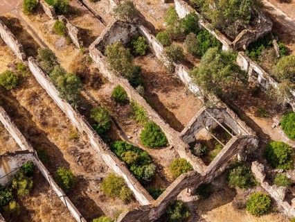 Ruins of former workshop halls, Mina de Sao Domingos, historic copper open-pit mine, aerial view,