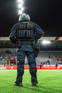 Police officer in combat gear Football stadium