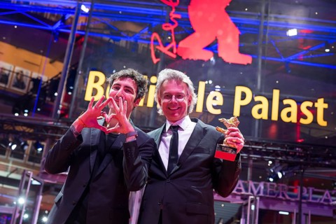 Ilker Çatak (director) and Ingo Fliesson (producer) pose with the Golden Bear for Best Film Arctia