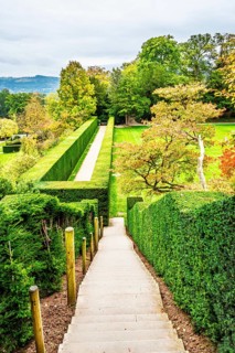 Autumn colors over Powis Castle and Garden, Welshpool, Powys, Wales, UK