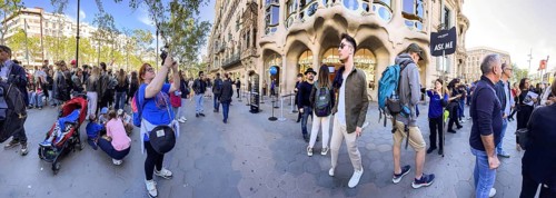 Many tourists at the Casa Batlló by Antoni Gaudi in Barcelona, Spain