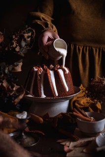 A delicious pumpkin, almond, and cinnamon bundt cake drizzled with white glaze. Perfectly spiced,