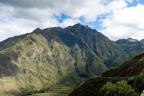 Lush green peaks of the Sacred Valley near Cusco, Peru, showcasing vibrant vegetation and majestic