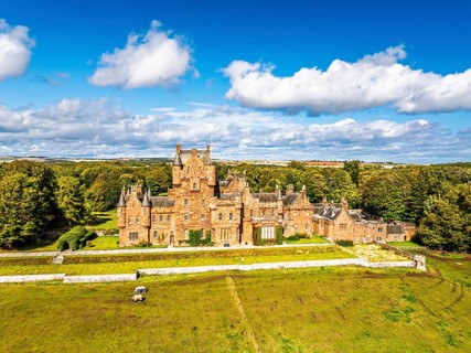 Ayton Castle from a drone, Ayton, Eyemouth, Scottish Borders, Scotland, UK