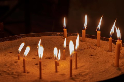 Sacrificial candles in a church, Apulia, Italy