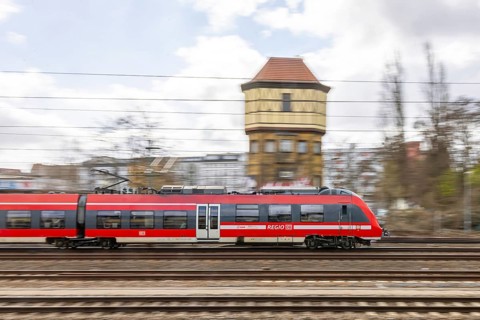 Beusselstraße station of the Berlin S-Bahn with regional train. motion blur. Berlin, Germany