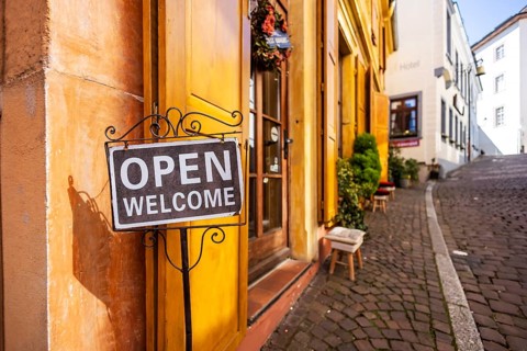 City view with narrow alley in the old town, sign with the inscription Welcome. Baden-Baden,
