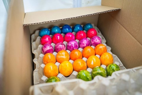 Colourful Easter eggs in an opened cardboard box, Easter campaign, Sindelfingen, Böblingen