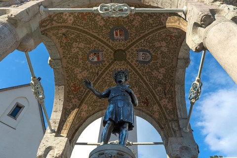 Sculpture of St. Magnus of Füssen, who is the apostle of the Allgäu, under a canopy, St. Mang