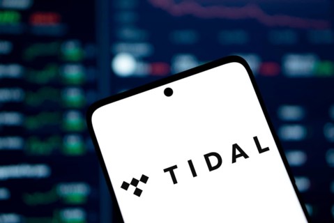 Tidal logo is displayed on smartphone. Tidal is a Norwegian-American music streaming service