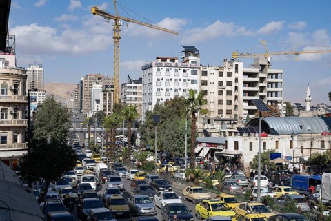 Damascus, Syria. December 7th 2025. A busy with traffic Al Thawra street with modern apartment
