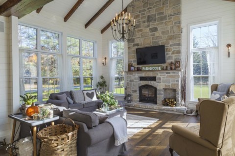Dark grey upholstered ektorp model sofas, bergere armchairs, tan, beige and grey nuanced natural