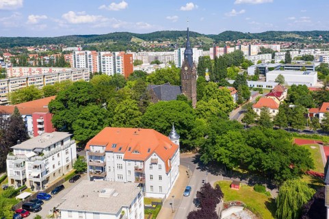 Aerial view of the New Church, in the background the grammar school and the new development area