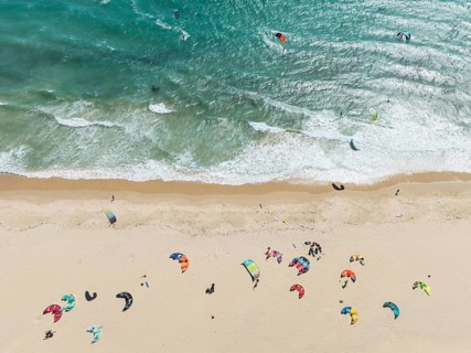Kite surfers at the Valdevaqueros beach near Tarifa. Aerial view. Drone shot. Cádiz province,