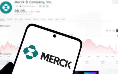 Merck logo is displayed on smartphone. Merck & Co Inc is an American multinational pharmaceutical