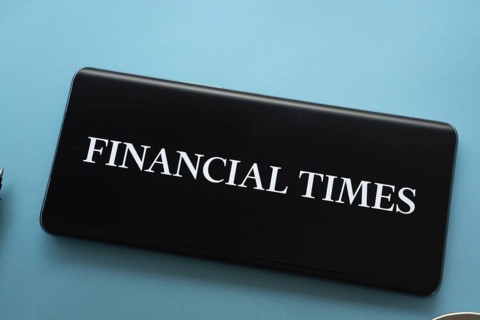 The logo of the Financial times is displayed on a smartphone screen
