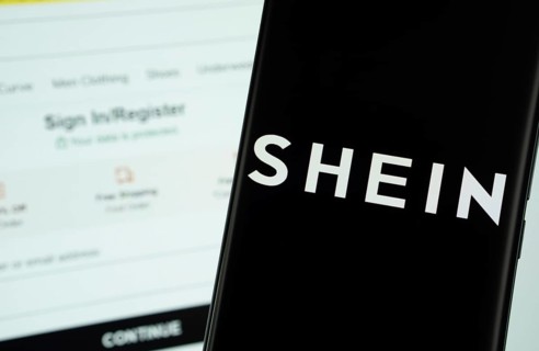 Dhaka, Bangladesh - 18 March 2025: The logo of the shein is displayed on a smartphone screen, and