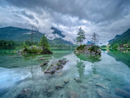 Rainy weather on Hintersee, low-hanging clouds cover the mountains, Ramsau near Berchtesgaden,