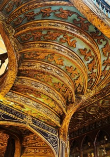 Livraria Lello, interior view of the Lello bookstore with rich decorations of the curved wooden