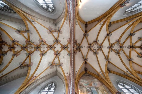 Ribbed vaulted vaulting with painting in the nave of the Church of the Assumption of Mary, late