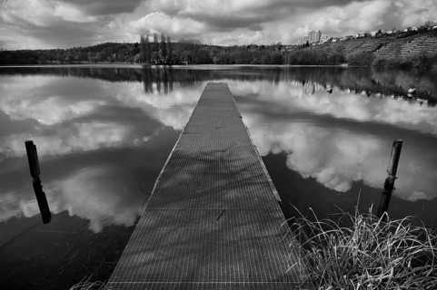Boat dock, jetty leads in Max-Eyth-See, Hofen, behind Freiberg near Stuttgart, black and white,