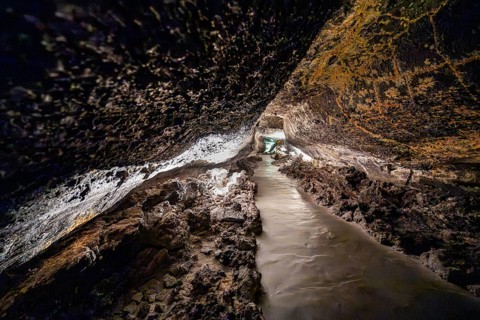 Underground cave formed by lava flow, illuminated lava cave, Cueva de los Verdes, Lanzarote, Canary