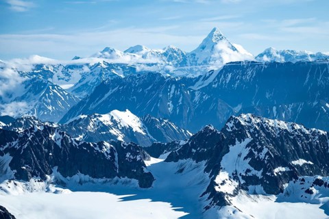 Snow and ice, epic mountains with glaciers, aerial view, Alaska Range, Denali National Park,