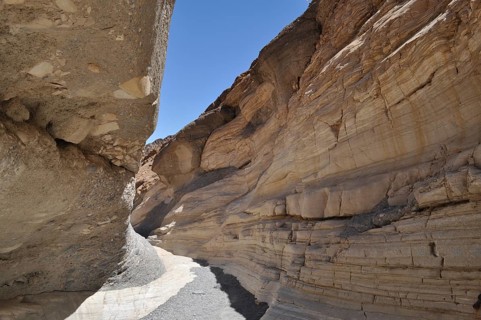 Curving rock formations in a gorge with distinctive striped pattern, Death Valley National Park,