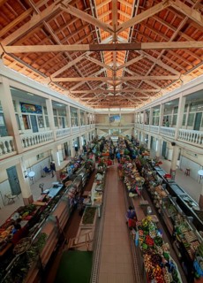 Panoramic view from above of the Mercado Municipal, Great Market Hall with many stalls and people