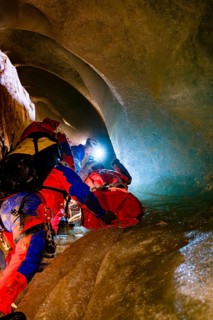 Cave rescuers from the Bavarian Mountain Rescue Service rescue an injured man from the Schellenberg