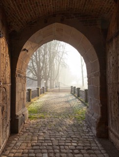 Old mighty wooden entrance gate to Bladenhorst Castle in autumn, Castrop Rauxel, Ruhr area, North