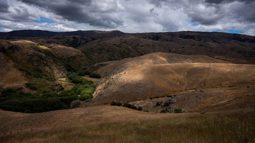 Landscape in New Zealand. View from Lindis Pass Tarras Road towards Cluden Creek Road. Lindis