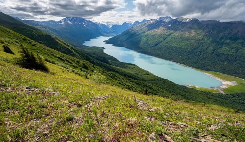 View of blue lake and mountains on Twin Peaks Trail, Eklutna Lake, Chugach Mountains, Chugach State