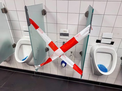 Broken urinal in an inn. Rottweil, Baden-Württemberg, Germany