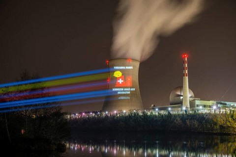 Protest action broadcast by the anti-nuclear organization, projection, night view, 05-03-2026,