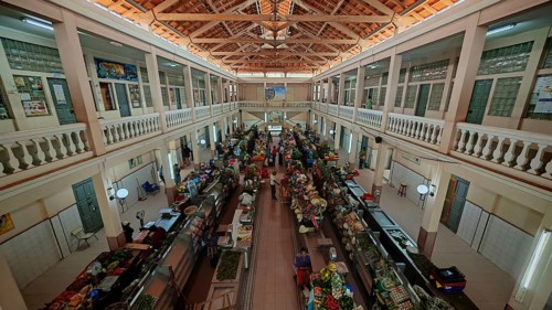 Panoramic view from above of the Mercado Municipal, Great Market Hall with stalls full of colorful
