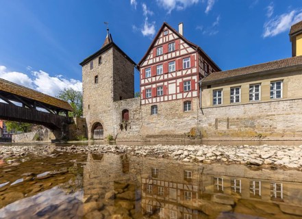 Sulfer Tower. Historic ensemble of buildings. Paved ford across a stove arm from the river island