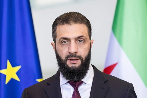 Ahmed al-Sharaa (President of the Syrian Arab Republic) at a joint press conference with Friedrich