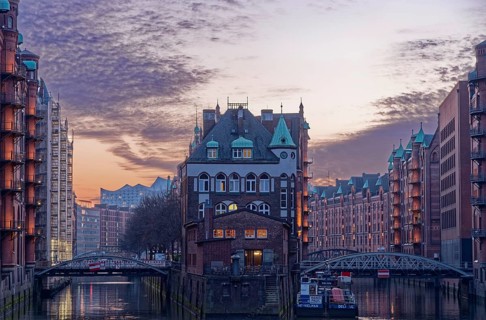 The moated castle in Hamburg's Speicherstadt between the Holländischbrookfleet and the