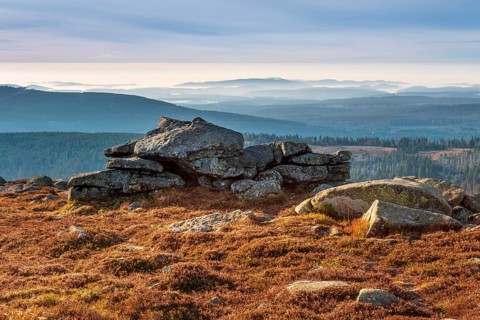 View from the summit of the Brocken to the south over the hills and forests of the Harz with