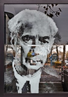 Portrait of Theodor Heuss on the glass pane at the underground exit Heussallee and Museumsmeile,