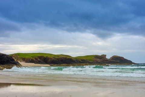 Coast with wavy sea, rocky shore and overcast sky, Clachtoll Beach, Clachtoll, Lairg, Scotland,