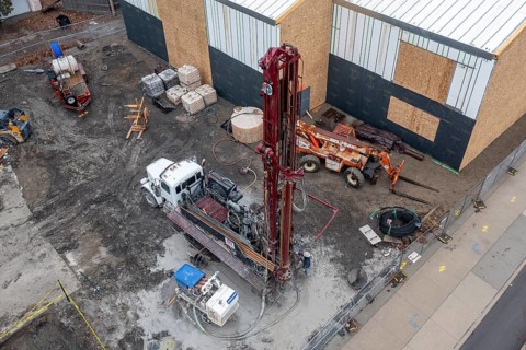 Detroit, Michigan - Workers for Crabtree Drilling drill a series of 500-foot deep wells for a